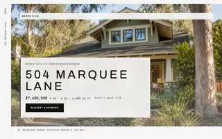 The Marquee template: a vertical menu rail and the address in wide capitals over a timber house behind a low wall