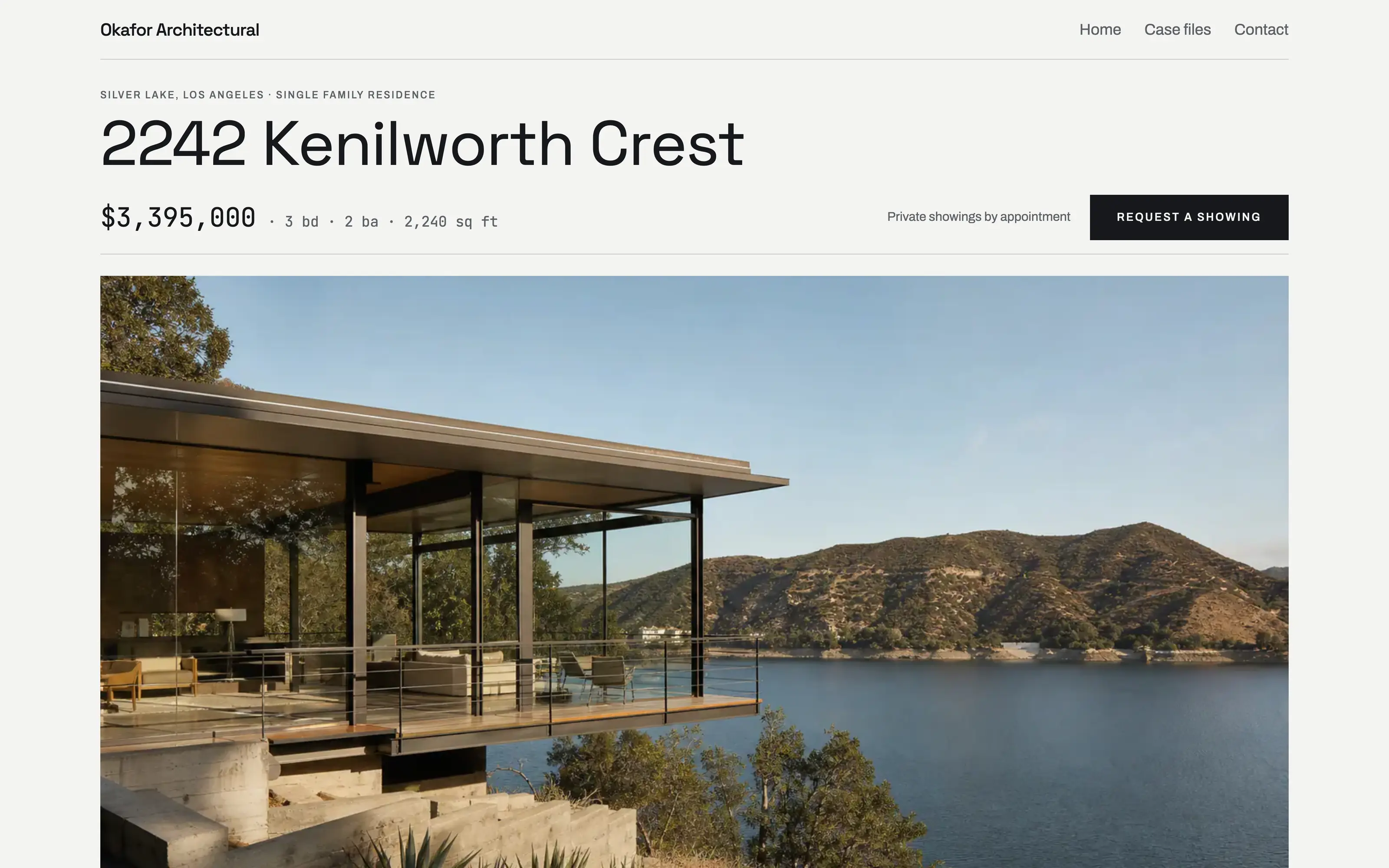 The 2242 Kenilworth Crest listing page on the live Vantage sample site: the address in a condensed sans, the price and specifications in mono, then an inset photograph of the steel-and-glass house cantilevered over the reservoir.